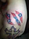rebel flag tear in skin tattoo foy my southern heritage