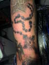 rosary and cross tattoo