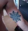 Dharma wheel tattoo