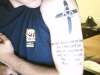 Religious upper left arm tattoo
