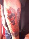 Skull & flames tattoo