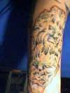 settys arm tattoo
