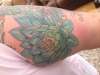 Blue and green lotus flower tattoo