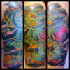 Dragon half-sleeve tattoo