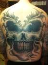 skull back peice tattoo