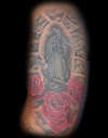 virgen de guadalupe and roses tattoo