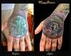 Hand cover up tattoo