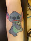 Stitch and doll tattoo