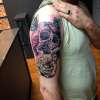 full color skull and rose tattoo sleeve for a man