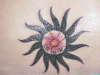 Sun w/ Flower tattoo