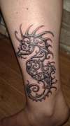 Filigree deco-style Seahorse tattoo