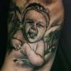 baby portrait by Steve'O tattoo