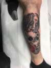 Girl and skull tattoo