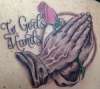 "In God's Hands" tattoo