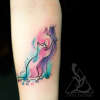 Small water color cat and butterfly wrist tattoo with splashes o