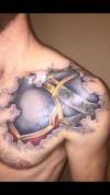 Tore skin armour tattoo
