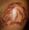 Tribal Broncos shoulder piece tattoo