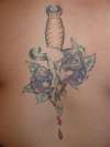 Rose and Dagger tattoo