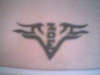 Tribal heart and Name tattoo