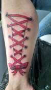 Grace's laces tattoo