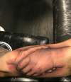Kids holding hands tattoo