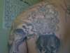 left back tattoo