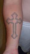 Cross on my right forarm tattoo