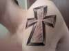 left arm cross tattoo