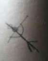 stick man crucifix tattoo