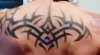 Back tribalism tattoo