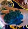 Blue grayscale rose tattoo