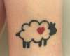 Sheep with heart tattoo