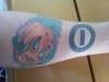 T.O.N. Logo & Sad Jack-O-Latern tattoo