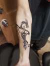 right arm dragon tattoo