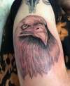 Bird head tattoo