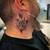 Rose on neck tattoo