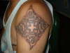 negative tribal tattoo