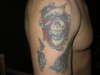 skull rip tattoo