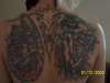 "back piece" tattoo