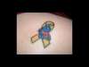 Childhood cancer/teenage years tattoo