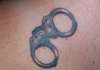 Handcuffs tattoo