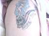 pipe skull with naked lady tattoo