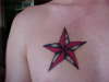 chest star tattoo