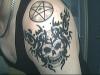 skull and pentagram tattoo