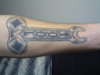 Tool - Wrench logo tattoo