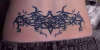 Ivy Tribal (color) tattoo