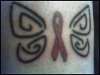 Breast Cancer Ribbon w/ Butterfly Wings tattoo