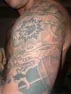 left arm japanese tattoo