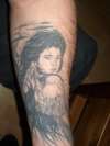 left forearm tattoo