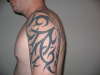 Tribal left arm tattoo